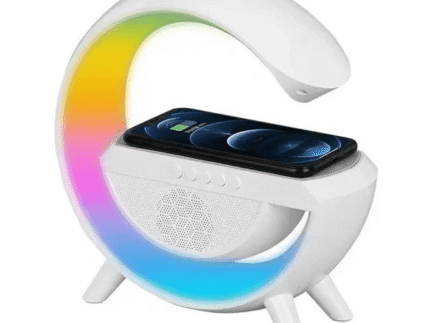 Modern 3-in-1 wireless charging lamp with RGB night light and built-in Bluetooth speaker, holding a smartphone on top