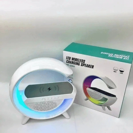 Modern 3-in-1 wireless charging lamp with RGB night light and built-in Bluetooth speaker, holding a smartphone on top