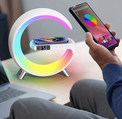 Modern 3-in-1 wireless charging lamp with RGB night light and built-in Bluetooth speaker, holding a smartphone on top