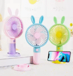 Shop the Cute Pocket Mini Handheld Fan – battery-powered, compact, and stylish personal fan for travel, office, and daily cooling. Quiet, portable & fun to use!